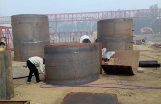 Water storage tank installation for denim mill operations